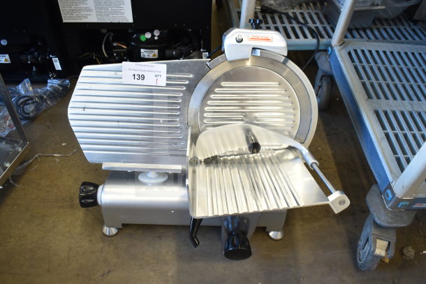 Brand new Avantco 177SL312 12" meat slicer with sharpening blade. Manual gravity feed, 110-120V, scratch and dent condition.