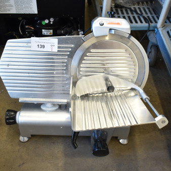 Brand new Avantco 177SL312 12" meat slicer with sharpening blade. Manual gravity feed, 110-120V, scratch and dent condition.
