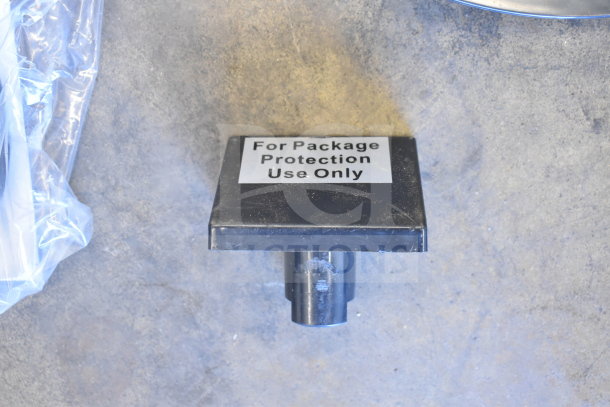 Protective cover for Avantco 177SL312 meat slicer, labeled "For Package Protection Use Only," placed on a concrete surface.
