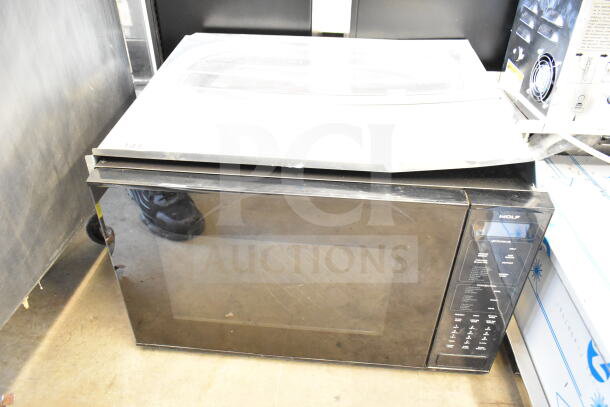 Wolf MWC24 Countertop Microwave Oven, 120V, 1 Phase, black finish, with control panel. Good condition. Model MWC24.