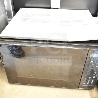 Wolf MWC24 Countertop Microwave Oven, 120V, 1 Phase, black finish, with control panel. Good condition. Model MWC24.
