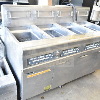 Frymaster BIGLA430CSD Commercial Floor Style Natural Gas Powered 4 Bay Fryer on Commercial Casters.