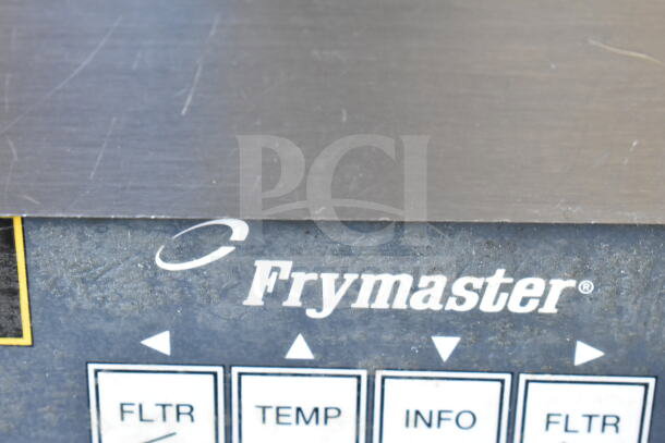 Frymaster BIGLA430CSD commercial fryer control panel, showing brand name and function buttons like FLTR, TEMP, and INFO.