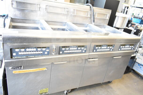 Frymaster BIGLA430CSD 3 Bay Fryer, natural gas, commercial floor model, on casters, control panels visible, used condition.