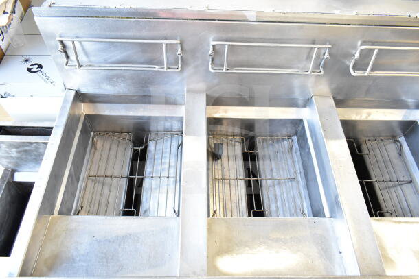Frymaster BIGLA430CSD 3-bay natural gas fryer on casters, commercial floor style, stainless steel, clean condition.