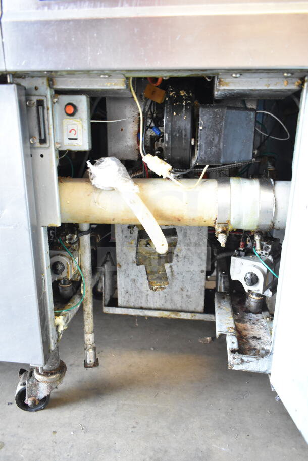 Frymaster BIGLA430CSD commercial 3-bay fryer, natural gas, floor style, on casters, visible internal components, used condition.