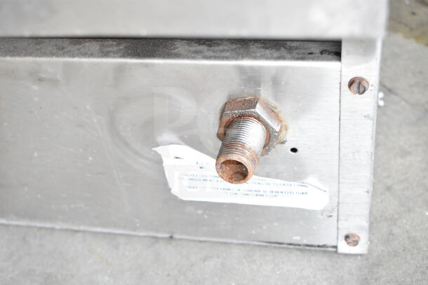 Pitco Frialator commercial deep fryer, gas-powered, metal fitting shown, surface wear visible.
