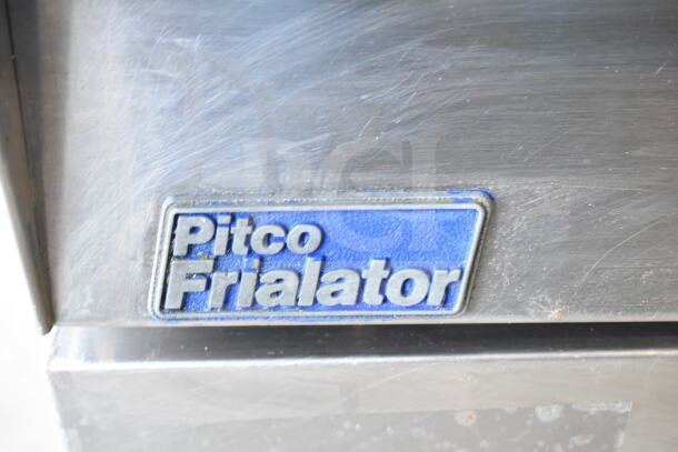 Pitco Frialator commercial countertop gas fryer, stainless steel, branded label visible, used condition.