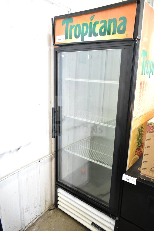 True GDM-26 commercial single door cooler with Tropicana branding. 115 volts, 1 phase. Good condition.