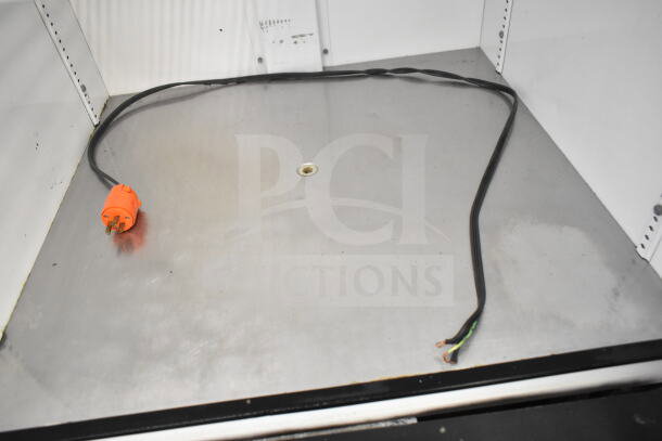True GDM-26 Commercial Cooler interior with shelves and wiring visible. Model label indicates 115 Volts, 1 Phase.