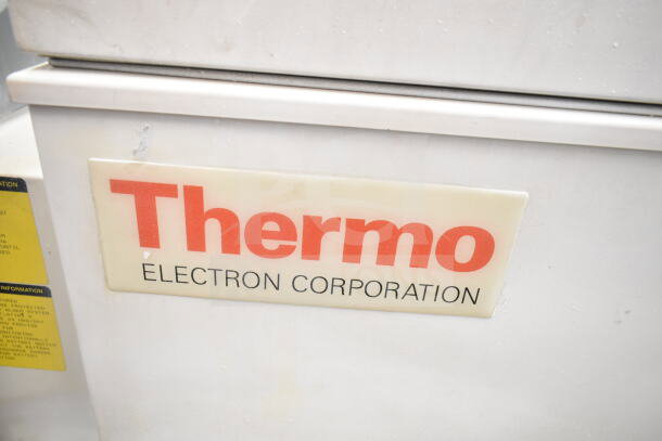 Thermo 8621 Chest Freezer, features Enviro-Scan unit. Thermo logo visible. Ideal for efficient storage.