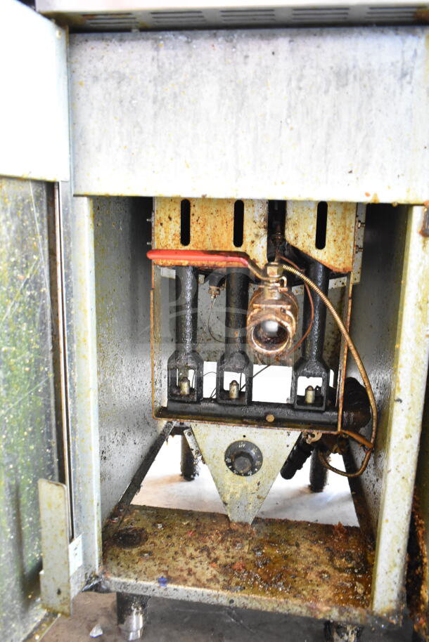 Vulcan 1VEG35M-1 commercial gas fryer, 69,000 BTU, interior view showing worn condition, no visible fry baskets.