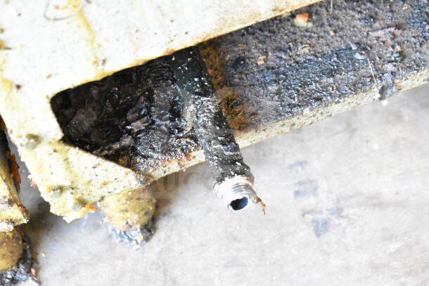 Vulcan 1VEG35M-1 deep fryer, greasy and worn condition, part of gas connection visible. 69,000 BTU, includes 2 fry baskets.