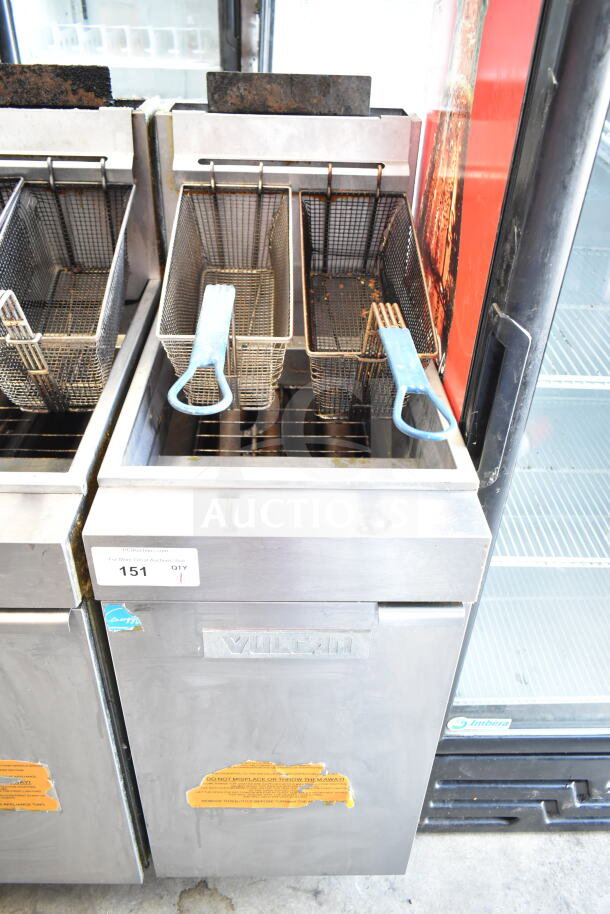 Vulcan commercial gas fryer with 2 baskets, stainless steel, visible wear, model details on front panel, auction ID tag 151.