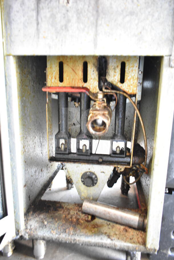Vulcan commercial gas deep fat fryer, floor style, with 2 fry baskets. Visible wear and rust on components.