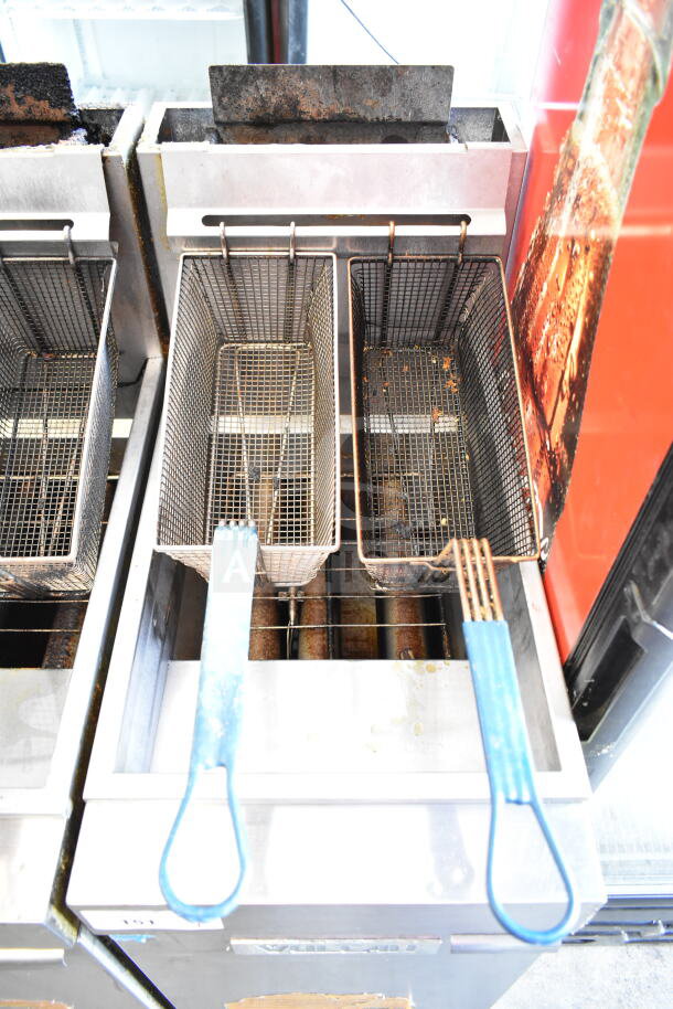 Vulcan commercial gas fryer with 2 baskets, floor style, showing signs of usage, ideal for high-capacity frying needs.