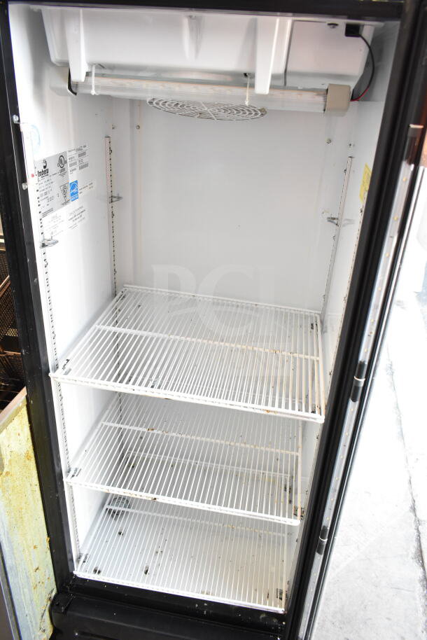 Imbera VR12 commercial single door reach-in cooler, clean interior, three white wire shelves, 115 volts, 1 phase.