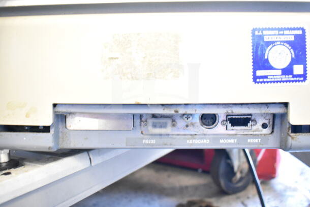 Hobart Quantum-1 food portioning scale, commercial-grade, 120V, 1 phase. Features RS232, keyboard, modem ports. Does not include power cord.
