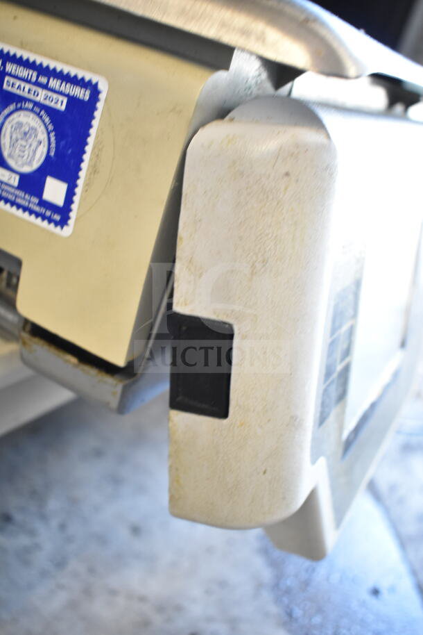 Hobart Quantum-1 food portioning scale, 120V, 1 phase. Blue inspection sticker visible. No power cord included. Tested.