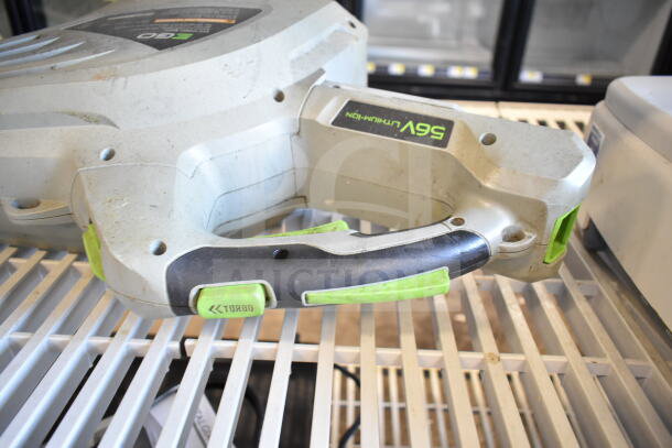 EGo Power+ 56V battery powered blower, used condition, visible "TURBO" button, ergonomic handle with wear.