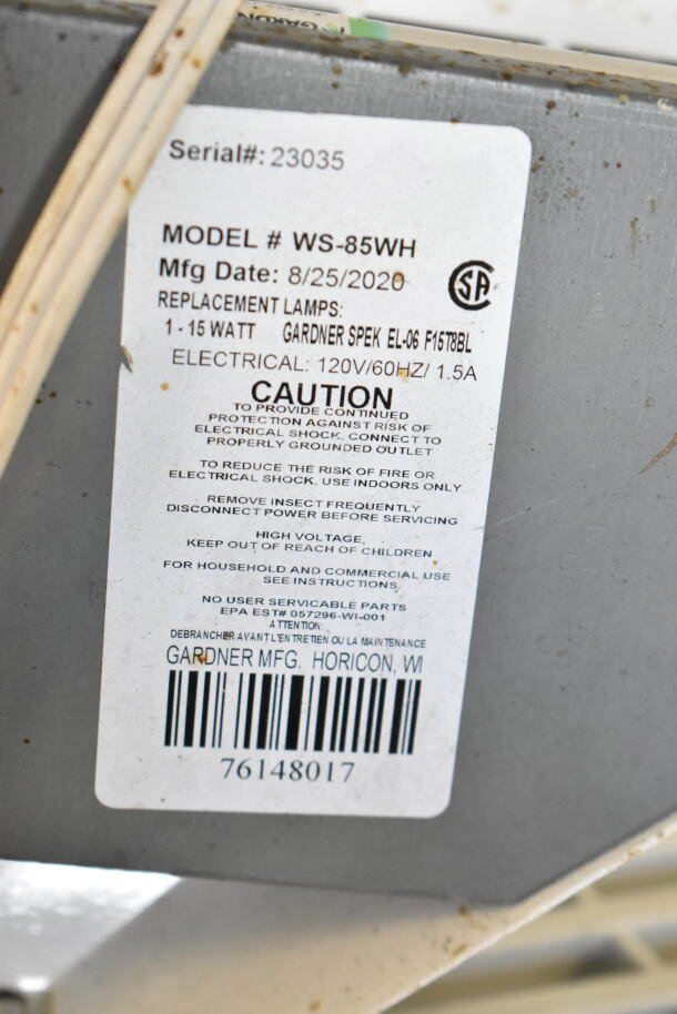 Gardner bug zapper label showing Model WS-85WH, 120V, 1.5A. Manufactured 8/25/2020. Caution and usage instructions included.