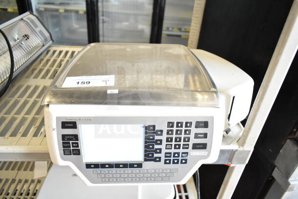 Hobart Quantum-P-1T commercial food portioning scale. No power cord. 120V, 1 phase. Tested and working. Tag labeled "159".