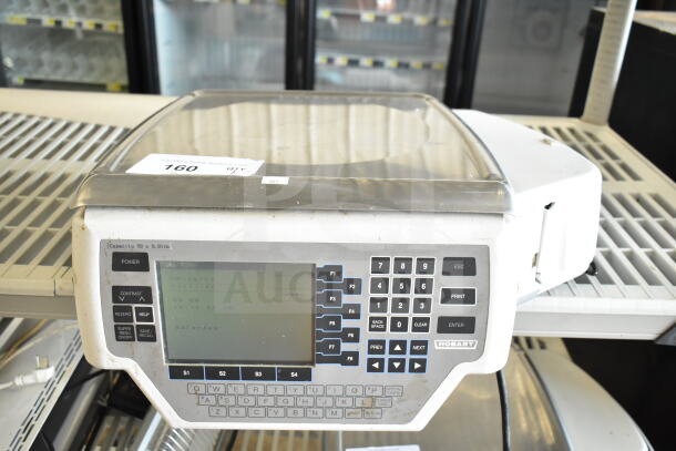 Hobart Quantum-1 commercial food portioning scale, tested and working, 120V, 1 phase, keypad controls, digital display.