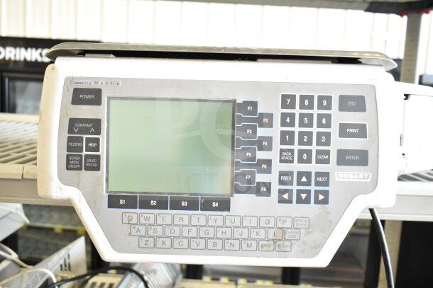 Hobart Quantum-1 food portioning scale, commercial countertop model, tested and working, 120V, 1 phase. Capacity: 30 lbs.