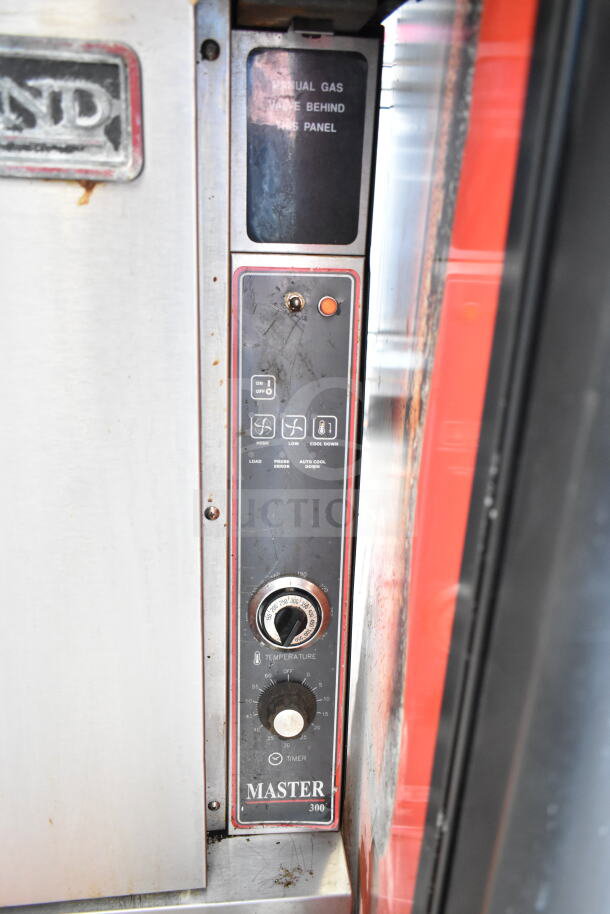 Garland commercial convection oven control panel, featuring thermostatic controls and manual gas valve label.
