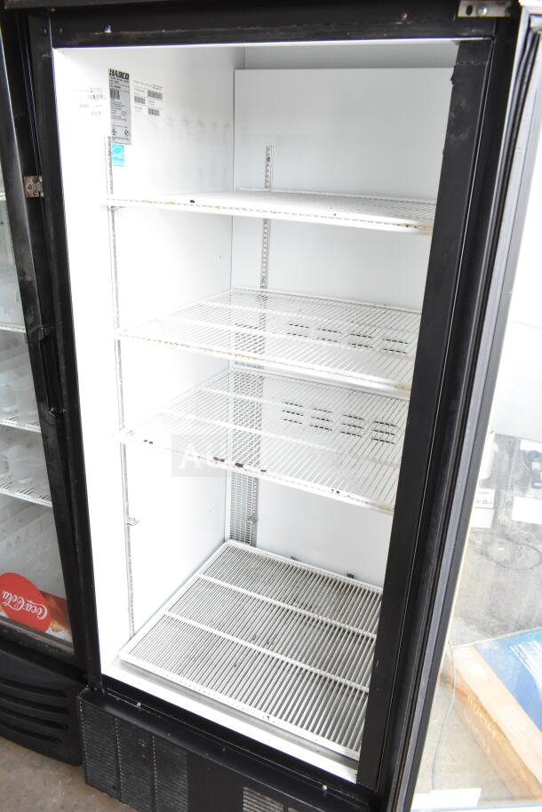 Habco ESM28 commercial single door reach-in cooler merchandiser, 115 volts, 1 phase, with three shelves and visible label.