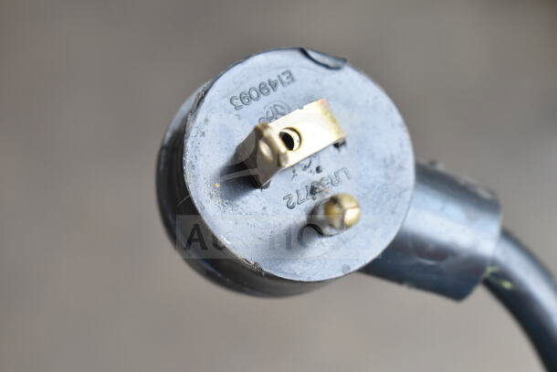 Close-up of a plug marked "E149093" from a Habco ESM28 Commercial Cooler, indicating electrical configuration for 115V, 1 Phase.