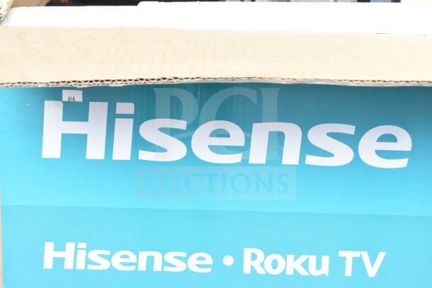 Hisense 58R6E5 UHD 4K 58" TV in original box. Brand new, includes Roku functionality, model and condition as labeled.