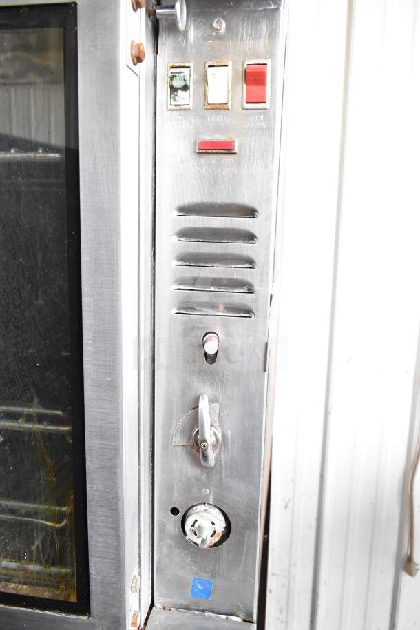 Blodgett commercial convection oven control panel with buttons and dials. Features view-through doors.