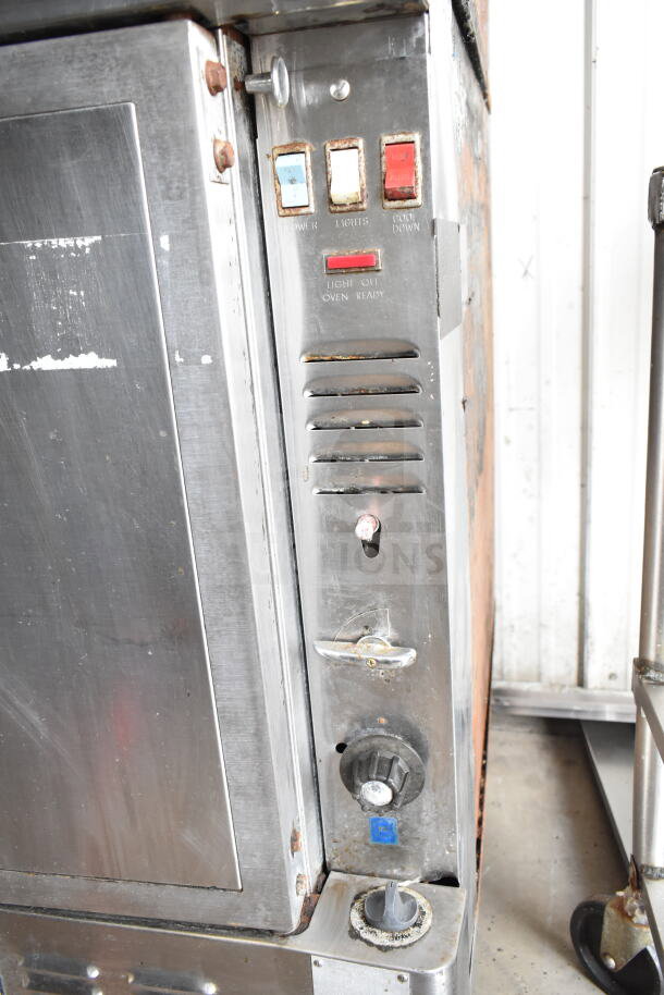 Blodgett commercial convection oven close-up, showing control panel with buttons and dials, slightly worn condition.