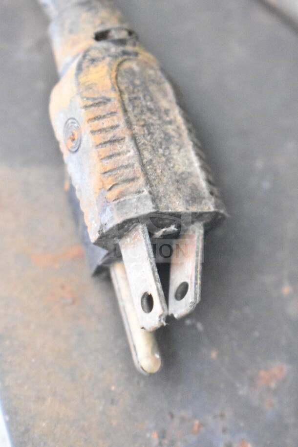 Close-up of a used, rusted electrical plug showing significant wear, possibly for a Blodgett convection oven.