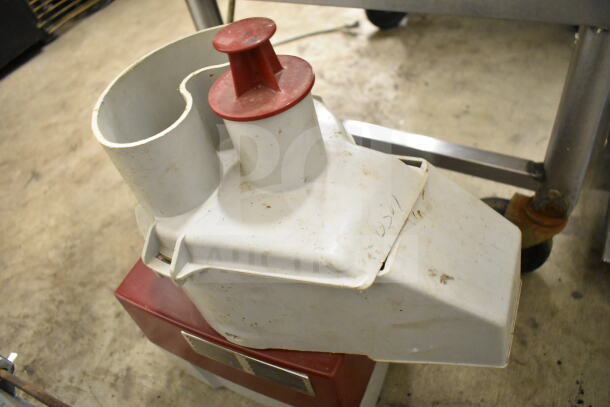 Robot Coupe R2N commercial food processor, 120 volts, 1 phase, used condition, visible wear and markings on exterior.