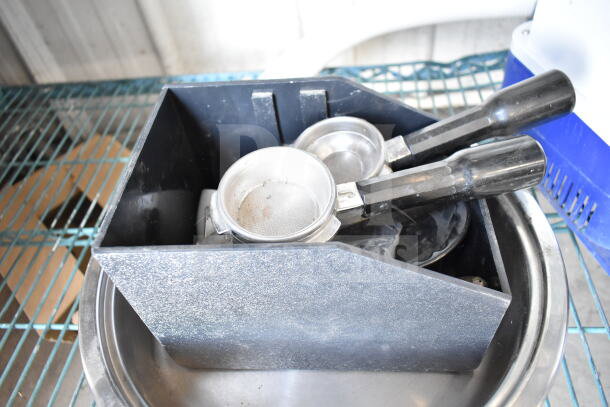 A collection of 7 items including bowls, portafilters, and a poly bin. Items appear used, suitable for coffee enthusiasts.
