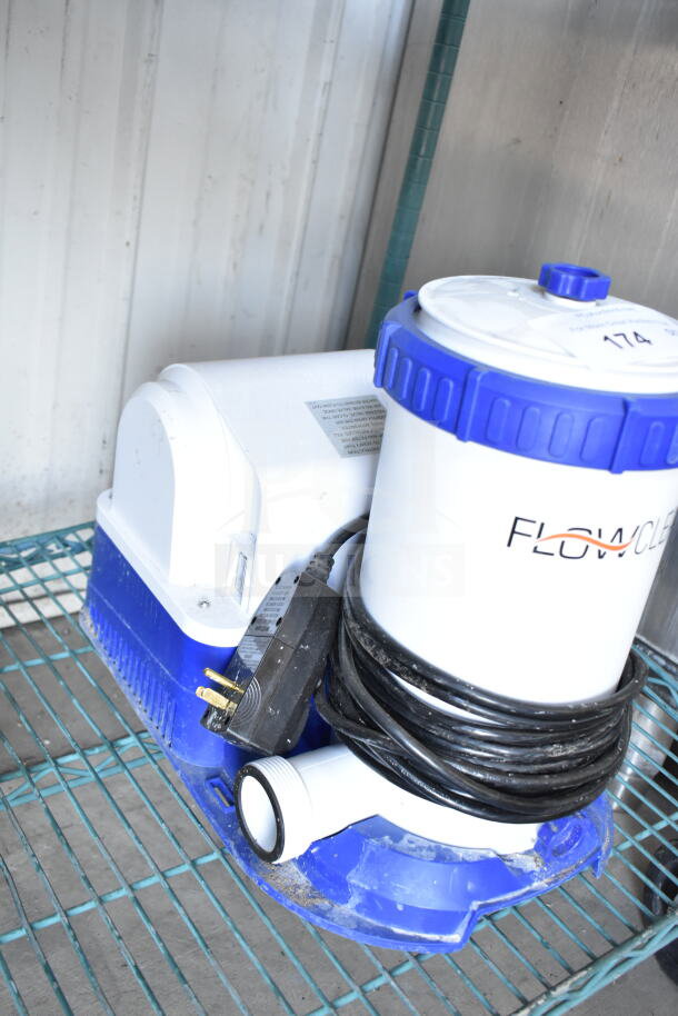 FlowClear 90403E Filter Pump, 110-120V, white and blue, visible power cord, slight wear, clear labeling.