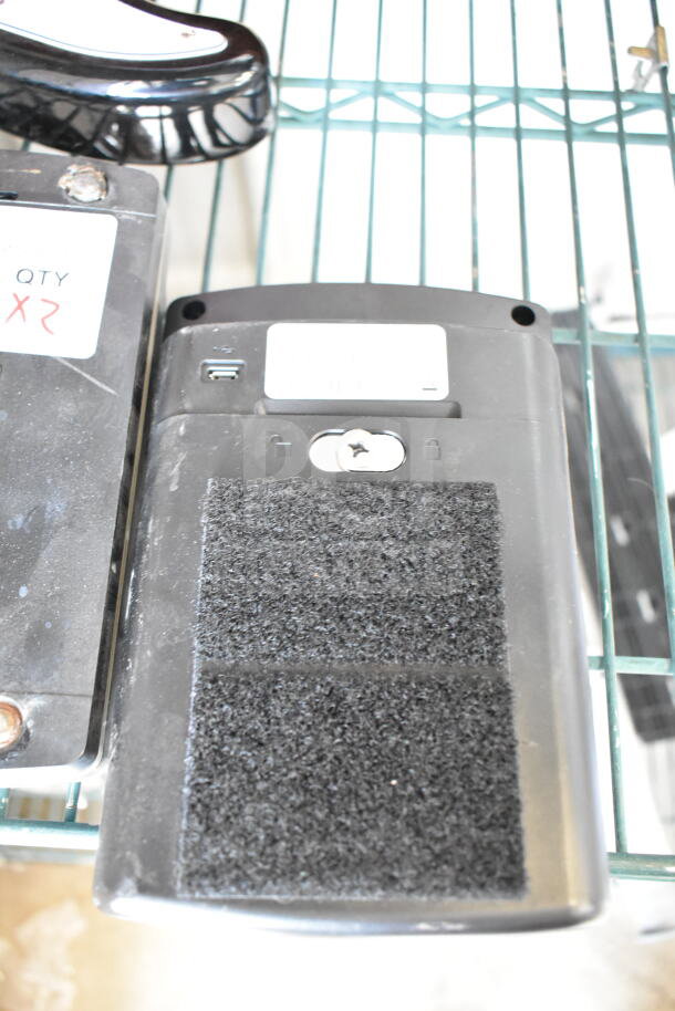 2 Motorola CB300-D 6-Channel UHF Digital Call Box, frequency 902-928 MHz, black, visible markings and label.