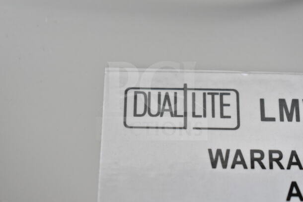 Dual Lite LMW40I-FW Emergency Light, label showing model and brand.