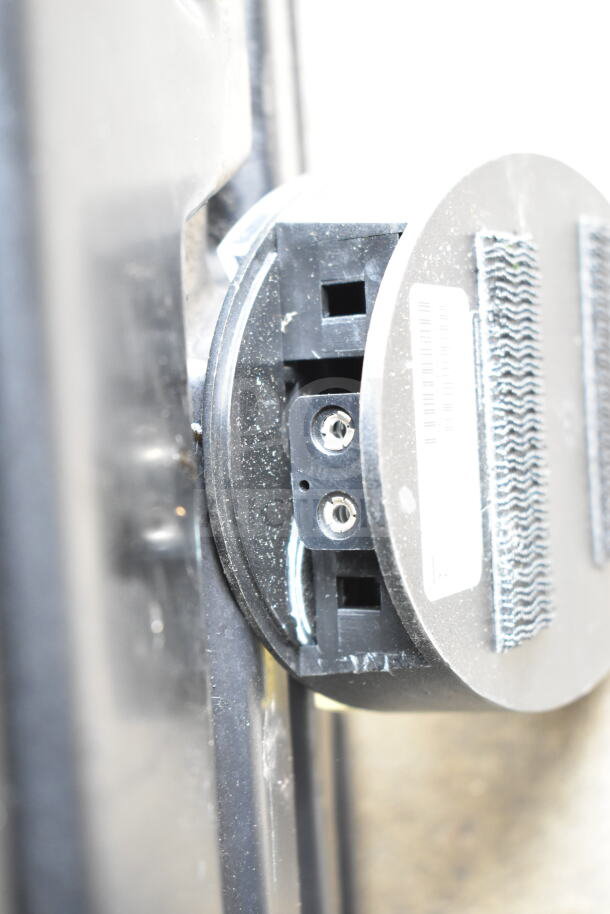 Close-up of a CB300-D digital callbox with visible connectors, part of a lot of 12 various items. Condition appears used.