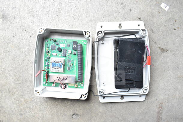 CB300-D Digital Callbox, open casing showing circuit board, wires, and battery compartment. Slight wear visible.