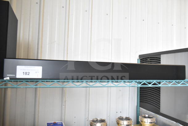 Samsung HW-T60MV Sound Bar, black finish, excellent condition, auction label indicating item number 182 visible.