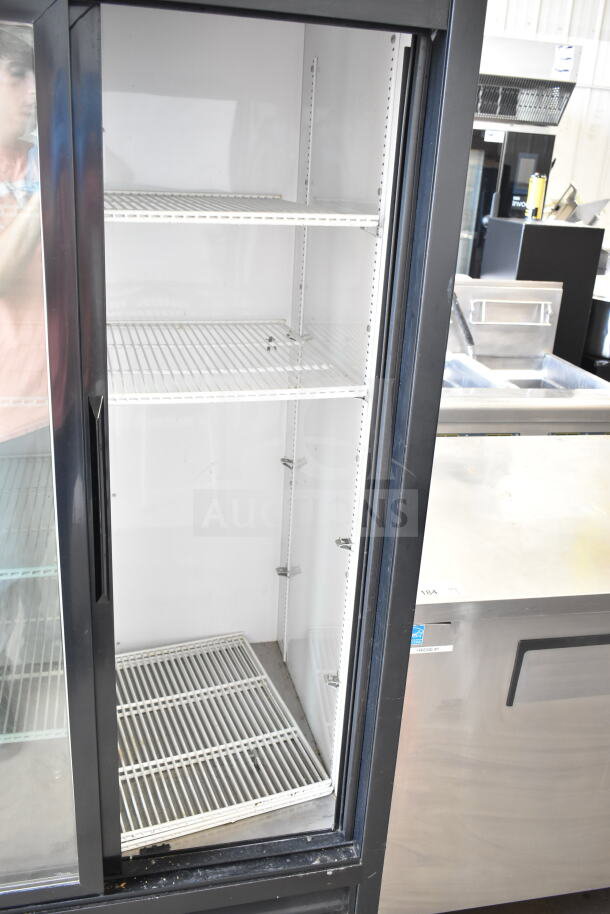 True GDM-33-LD 2 Door Cooler Merchandiser; commercial, 115V, 1 Phase; empty shelves, glass doors, white interior.