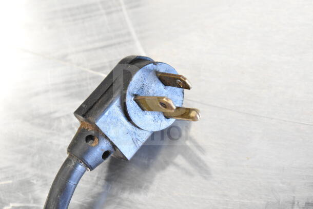 A close-up of the electrical plug for the True TUC-60 Commercial 2 Door Undercounter Cooler, 115 Volts, 1 Phase.