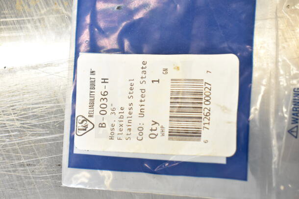 T&S B-0036-H 36" flexible stainless steel hose in original packaging with label showing model and quantity details.