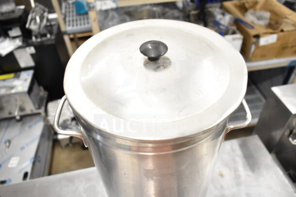 Three stainless steel satellite servers with lids and handles, including FC043 model, in good condition.
