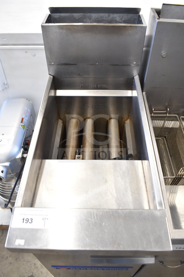 Bakers Pride commercial gas deep fat fryer, stainless steel, floor style, used condition, visible control panel and fryer tubes.