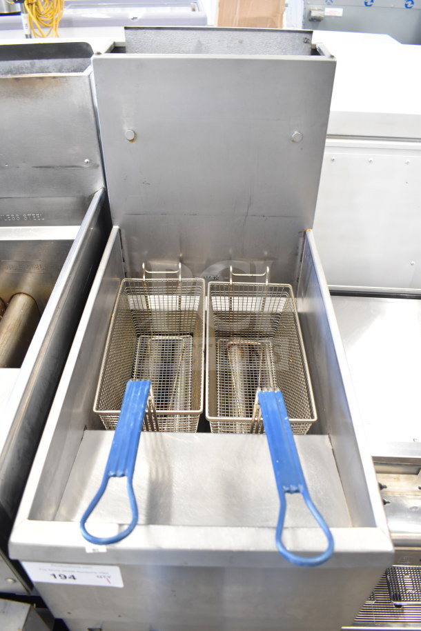 2019 Pitco Frialator commercial fryer, natural gas, 107,000 BTU, on casters. Features dual baskets with blue handles.