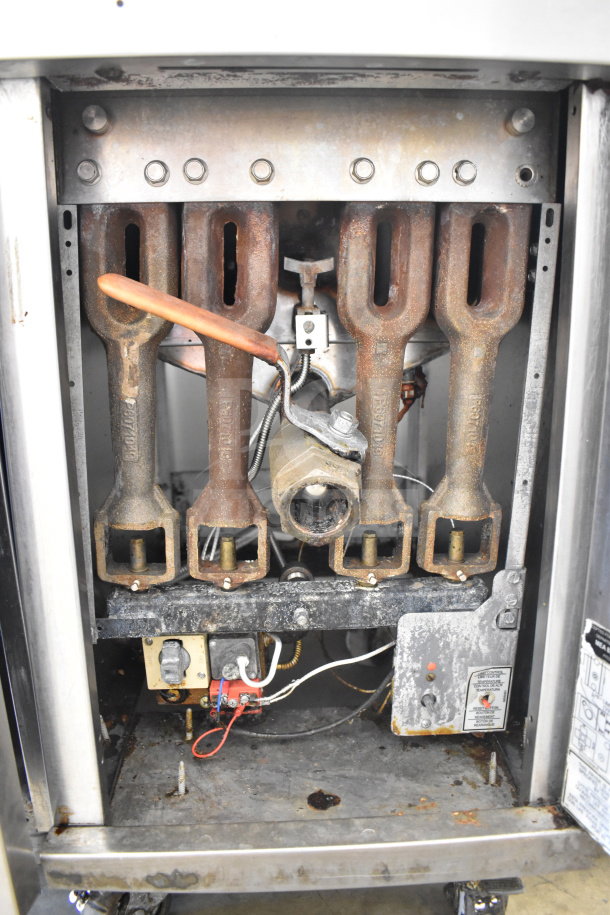 2019 Pitco Frialator natural gas fryer, 107,000 BTU, commercial casters, showing internal components, used condition.